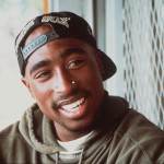 **FILE**Rap musician Tupac Shakur is shown in this 1993 photo. Another rapper, Proof, was shot in the head Tuesday, April 11, 2006, on the same Eight Mile Road in Detroit that he and Eminem made famous in movies and songs. He joins a long list of rap stars including Shakur, the patron saint of slain rappers, who was famously doomed by his fascination with the "thug life." (AP Photo)